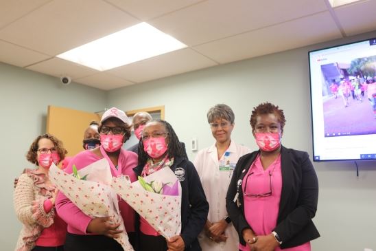Morris Heights Health Center Employees Wearing Pink Shirts